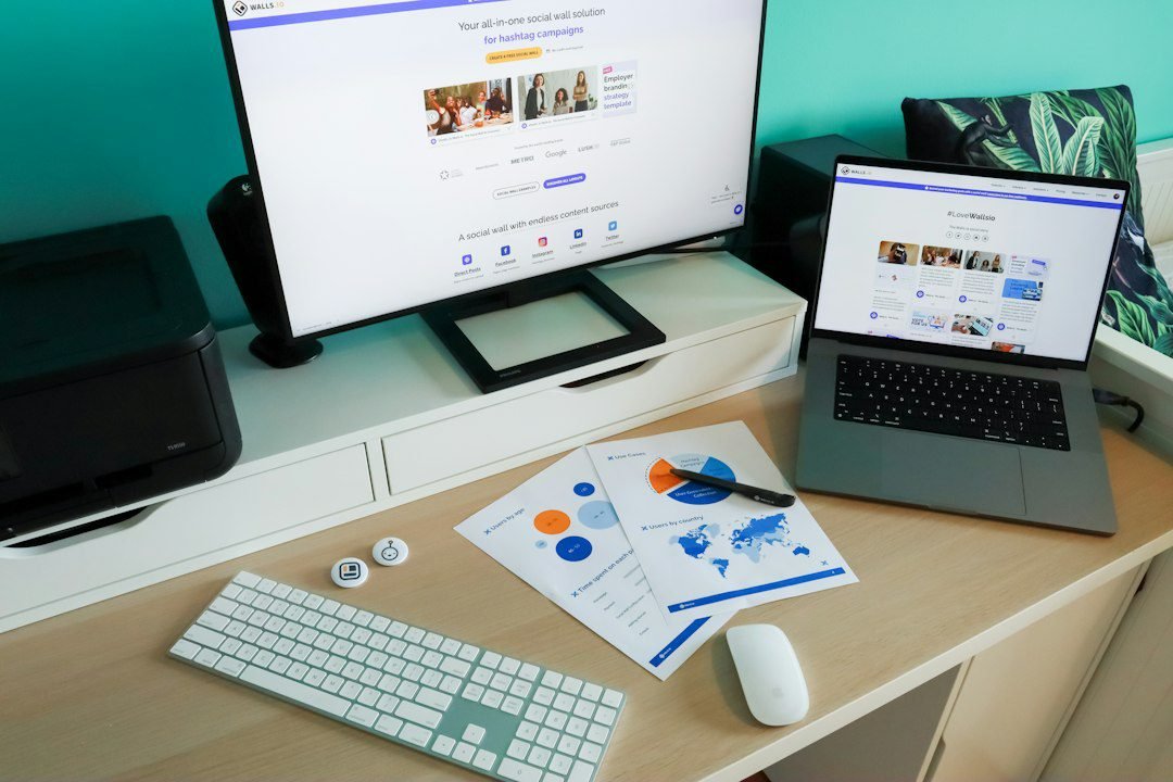 Business workspace with screens showing marketing and CRM analytics
